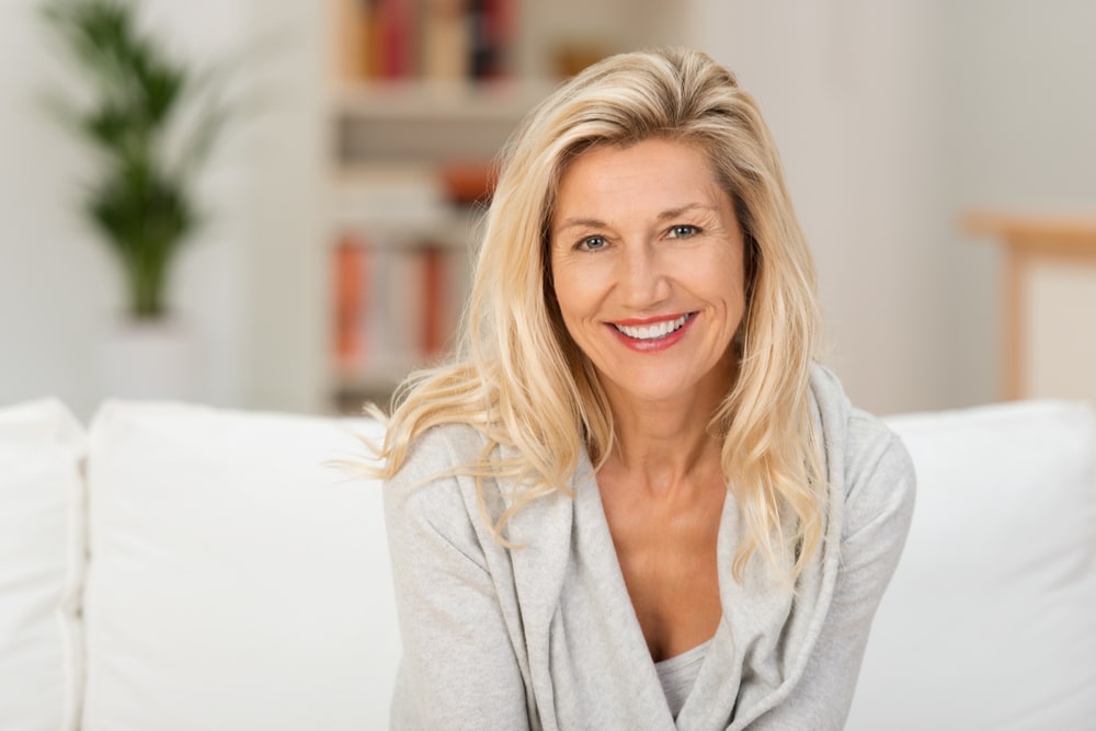 Lovely middle-aged blond woman with a smile